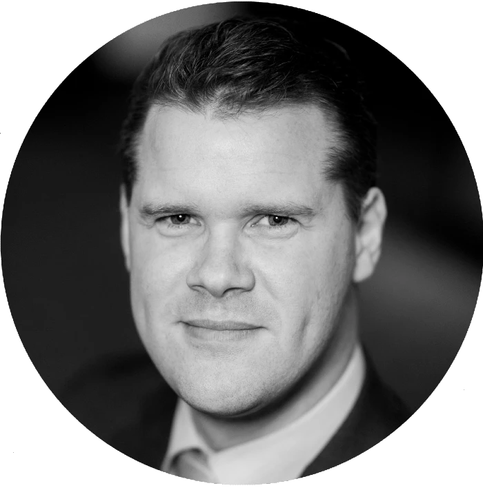 Rund profilbild i svart-vitt på Björn Karlsson Onlinemarknadsförare